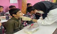 معاینه دهان و دندان دانش آموزان مدرسه سد لتیان به مناسبت هفته سلامت